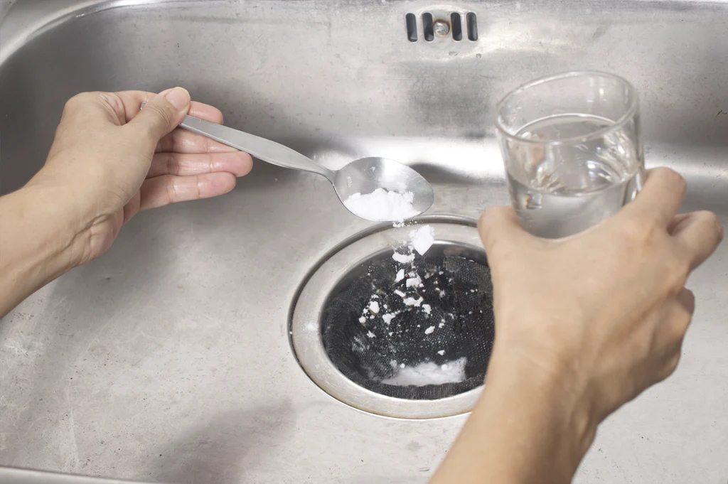 Is it OK to pour boiling water down the drain?